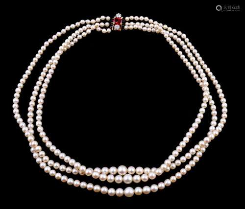 A three strand cultured pearl necklace, composed of graduating cultured pearls, measuring 3mm to