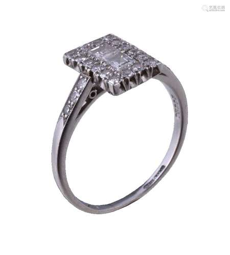 A 1930s diamond ring, the rectangular panel set with square cut diamonds within a surround of