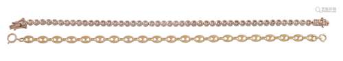 A 9 carat gold diamond tennis bracelet, set along the line with brilliant cut diamonds,