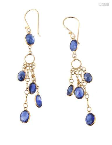 A pair of sapphire ear pendants, set with a fringe of oval cut sapphires, suspended from a further