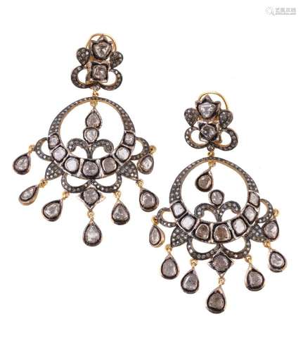 A pair of diamond earrings, the chandelier style earrings set with polki diamonds, with post