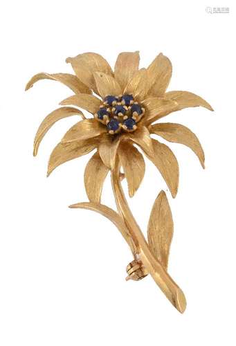 A 1960s 18 carat gold sapphire brooch, designed as a flower set with a cluster of circular cut