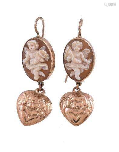 A pair of cameo earrings, the oval shell panel carved with a cherub, suspending a heart shaped