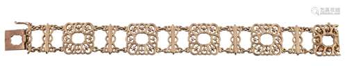 A fancy link bracelet, the pierced square panels to the concealed clasp, stamped 585, 18cm long,