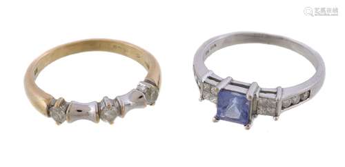 A diamond and tanzanite dress ring, the central square cut tanzanite between princess cut diamond