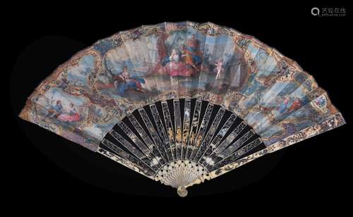 ϒ An ivory fan, late 18th century, the guards and sticks pierced and painted with figures, the paper