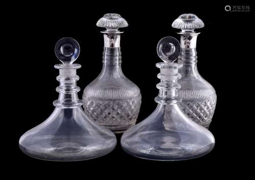 A pair of silver mounted cut glass decanters and stoppers by Barker Brothers Silver Ltd,