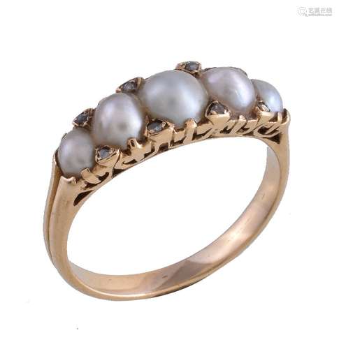 A late Victorian pearl and diamond ring, circa 1890, the pearls with diamond points in between,