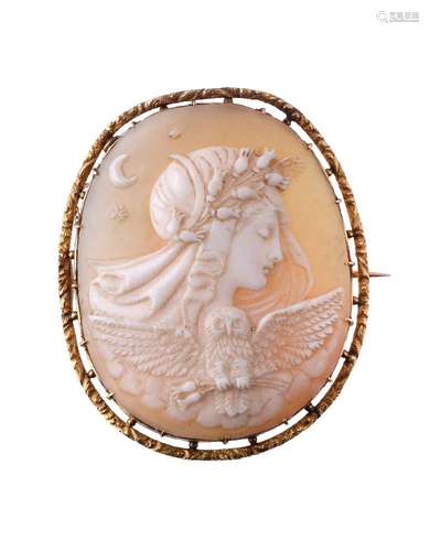 A Victorian shell cameo, circa 1870, the oval shell cameo carved with the profile of Nyx with