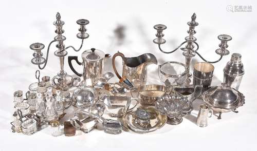 A collection of electro-plated items, including: a pair of silver toast racks (both damaged), a