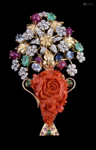 ϒ An Italian multi gem set giardinetto brooch, designed as a foliate spray, the carved coral flower