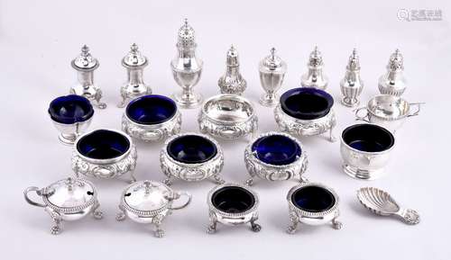 A collection of silver cruet items, including: a set of four Victorian cauldron salt cellars by