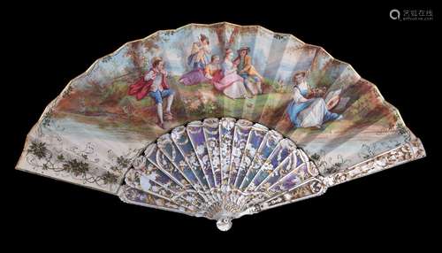 ϒ A mother of pearl fan, 19th century, the guards pierced and gilded,