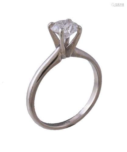 A single stone diamond ring, the brilliant cut diamond in a raised claw setting, estimated to