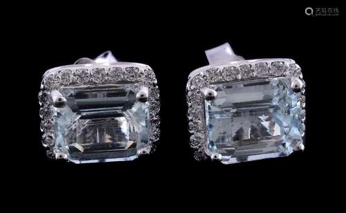 A pair of aquamarine and diamond earrings, the rectangular cut aquamarine in a four claw setting,