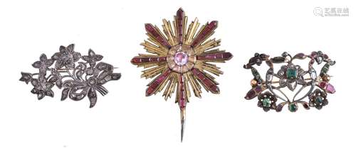 A 19th century gem set floral brooch, the openwork foliate panel set with vari cut emeralds,