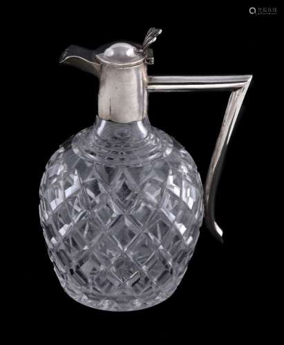 An Edwardian silver mounted cut glass claret jug, probably by Norton & White, Birmingham 1902,