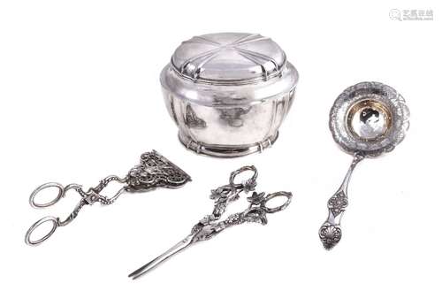 A Czechoslovakian silver shaped oval tea caddy, 1922-29 3rd standard (.800); a German vine pattern