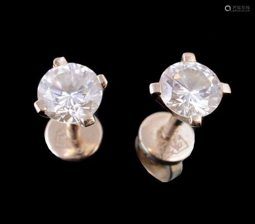 A pair of diamond single stone ear studs, the brilliant cut diamonds, weighing approximately 1.00