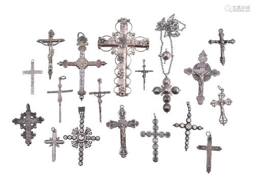 A group of antique and later silver cross pendants and crucifix pendants, various sizes