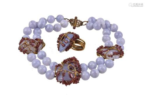 A blue lace agate and garnet necklace and ring, the necklace with polished blue lace agate beads