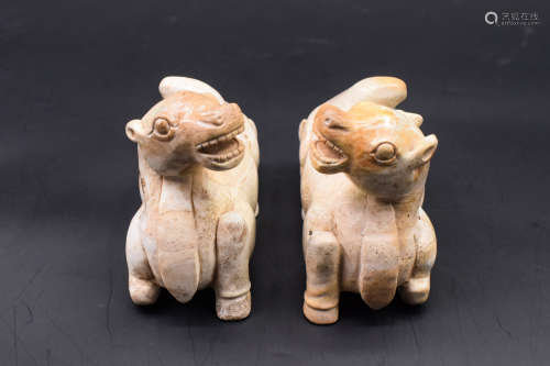 PAIR OF CARVED CAMEL FIGURES