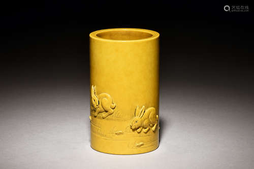 YELLOW GLAZED 'RABBITS' BRUSH POT