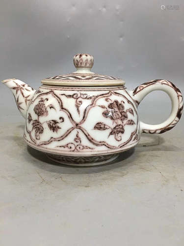 A RED GLAZED FLOWER PATTERN TEAPOT