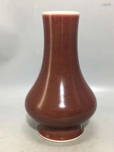 A RED GLAZE FLASK