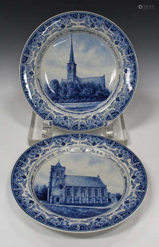 A pair of Joost Thooft & Labouchere (Royal Delft) circular wall chargers, early 20th century, each