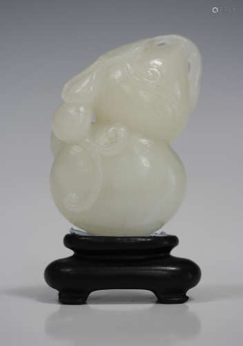 A Chinese white jade carving, probably 20th century, modelled in the form of a gourd, height 6cm,