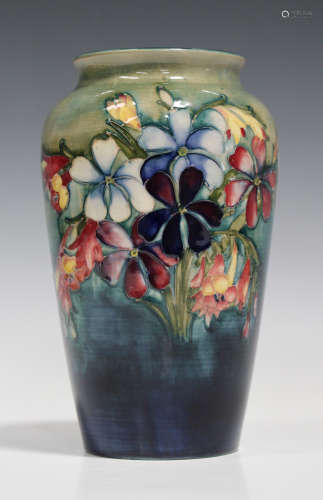 A Moorcroft pottery vase, circa 1928-49, the high shouldered body decorated with Spring Flowers