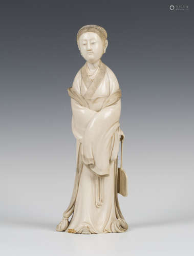 A Japanese exhibition quality ivory okimono figure of a lady by Munehisa, Meiji period, superbly