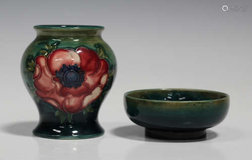 A diminutive Moorcroft pottery vase, circa 1949, the baluster body decorated with Anemone design