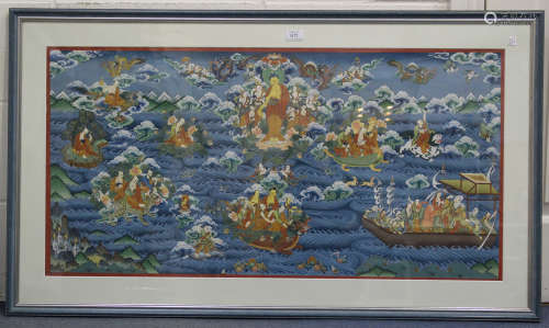 A Tibetan thangka, 20th century, painted in gouache with Buddha accompanied by further Buddhistic