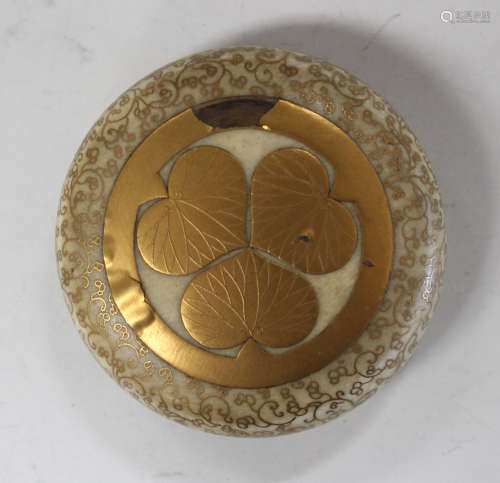 A Japanese lacquer circular box and cover, Meiji period, the top with gilt Togugawa mon within