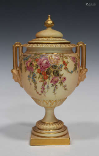 A Royal Worcester porcelain blush ivory two handled vase and cover, circa 1908, with gilt enriched