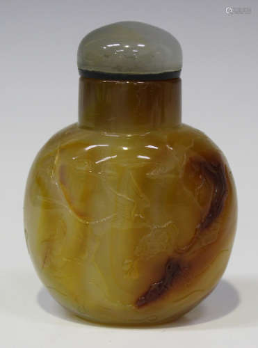 A Chinese agate snuff bottle and stopper, 19th/20th century, of well hollowed flattened circular