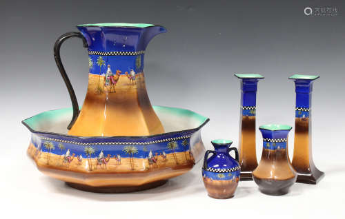 A group of H & K Tunstall pottery, each decorated with an Egyptian desert scene, including a wash