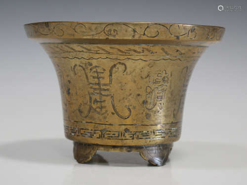 A Chinese polished bronze censer, late Qing dynasty, of flared circular form, the exterior