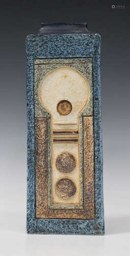 A Troika pottery rectangular vase, circa 1970-83, by Sue Low, each side decorated in relief with