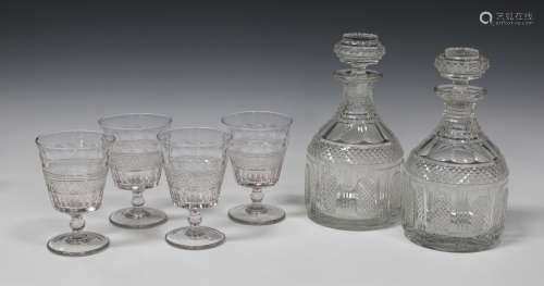 A pair of cut glass decanters and stoppers, late 19th century, with panels of hobnail cut detail