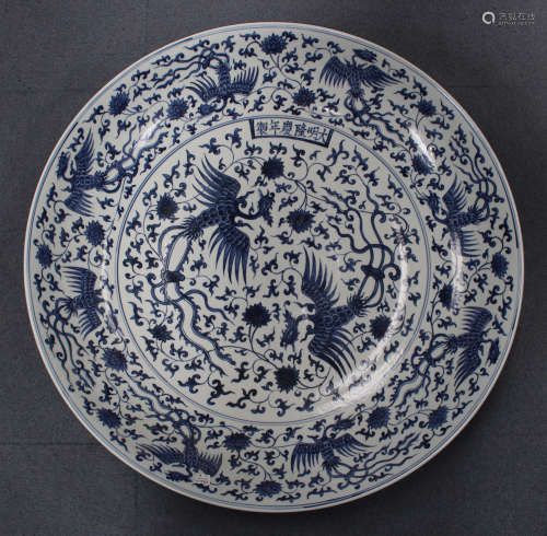 A large Chinese Ming style blue and white porcelain circular dish, mark of Longqing but modern,