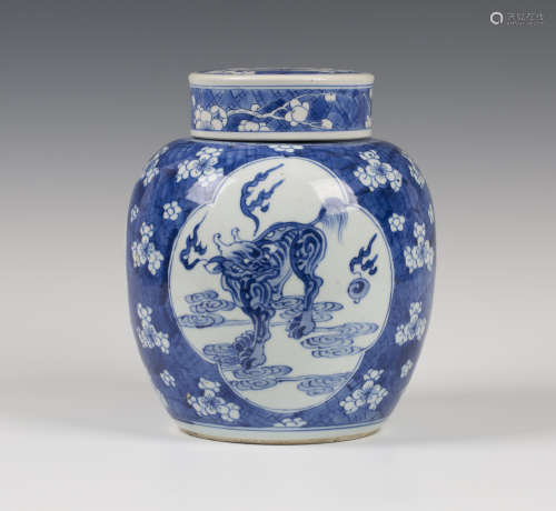 A Chinese blue and white porcelain ginger jar and cover, Kangxi period, the ovoid body painted