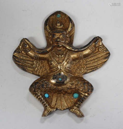 A Chinese gilt metal figure of a winged deity with turquoise bead embellishment, length 9cm.Buyer’
