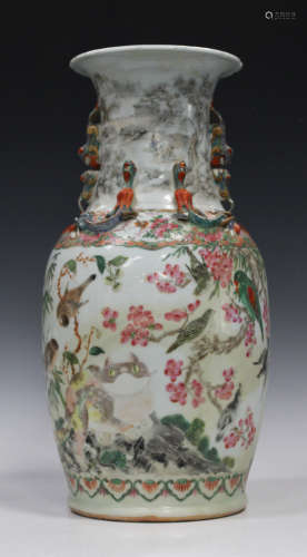 A Chinese famille rose porcelain vase, mid/late 19th century, painted with a cat and birds amongst