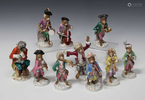 A set of nine Continental porcelain Meissen style Monkey Band figures, 20th century, unmarked,