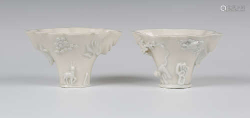 A pair of Chinese blanc-de-Chine porcelain libation cups, 18th century, each horn form body
