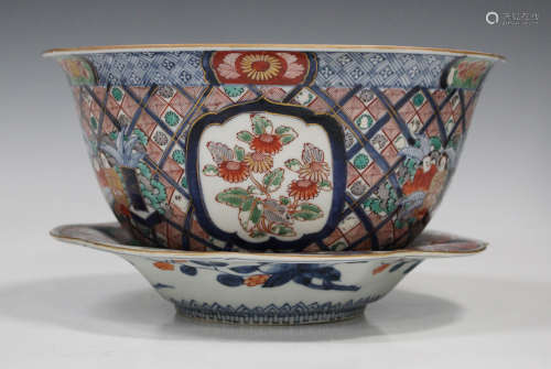 A Japanese Imari porcelain bowl, Meiji period, of flared circular form, painted with figures and