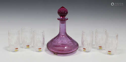 A pink tinted, engraved and cut glass Moser decanter and stopper, post-1925, the bulbous body
